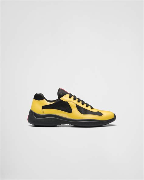 prada black and yellow shoes|high top black prada sneakers.